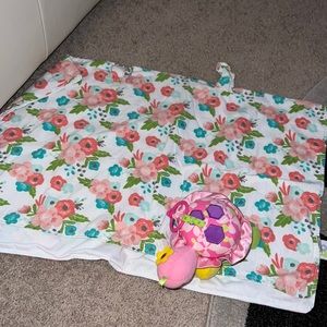 Car seat cover from Target with turtle rattle to hang